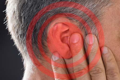Man Covering Ear With Hand