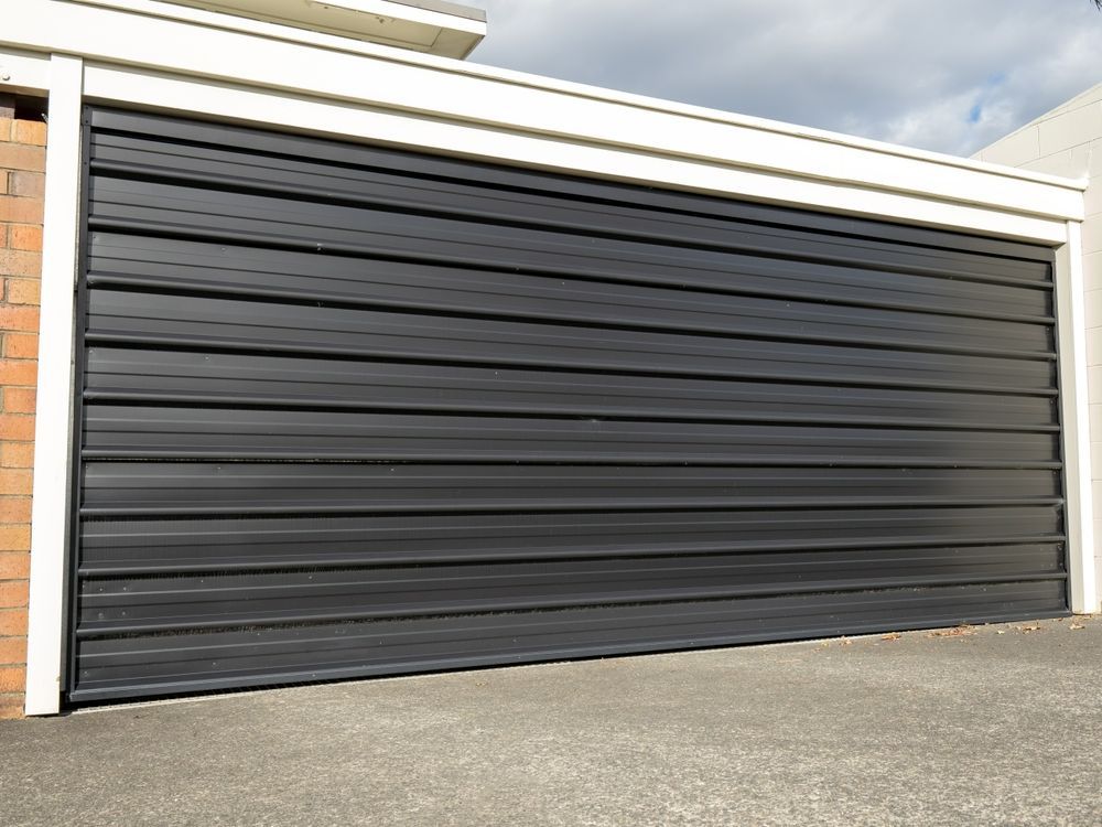 Black Horizontal Panel Garage Door — Duncan's Doors In Millerman, QLD