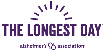 The Longest Day logo: Purple text with 