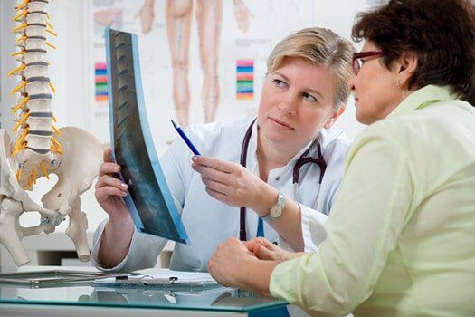 Chiropractor Doctor with Patient - Chiropractic Services in Anderson, SC