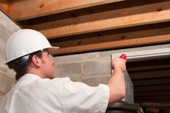 inspector checking for termite damage