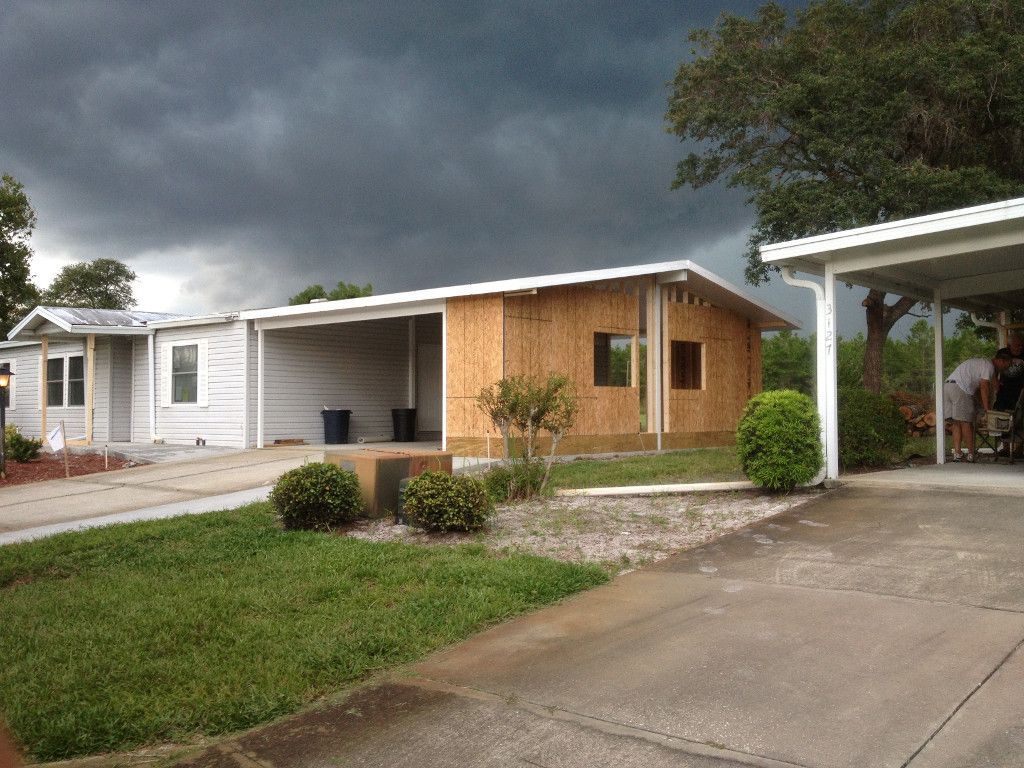 Houses With Stormy Sky - DeLand, FL - Phelps Aluminum & Supply LLC