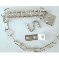 A close up of a chain with hooks and plates on a white surface.