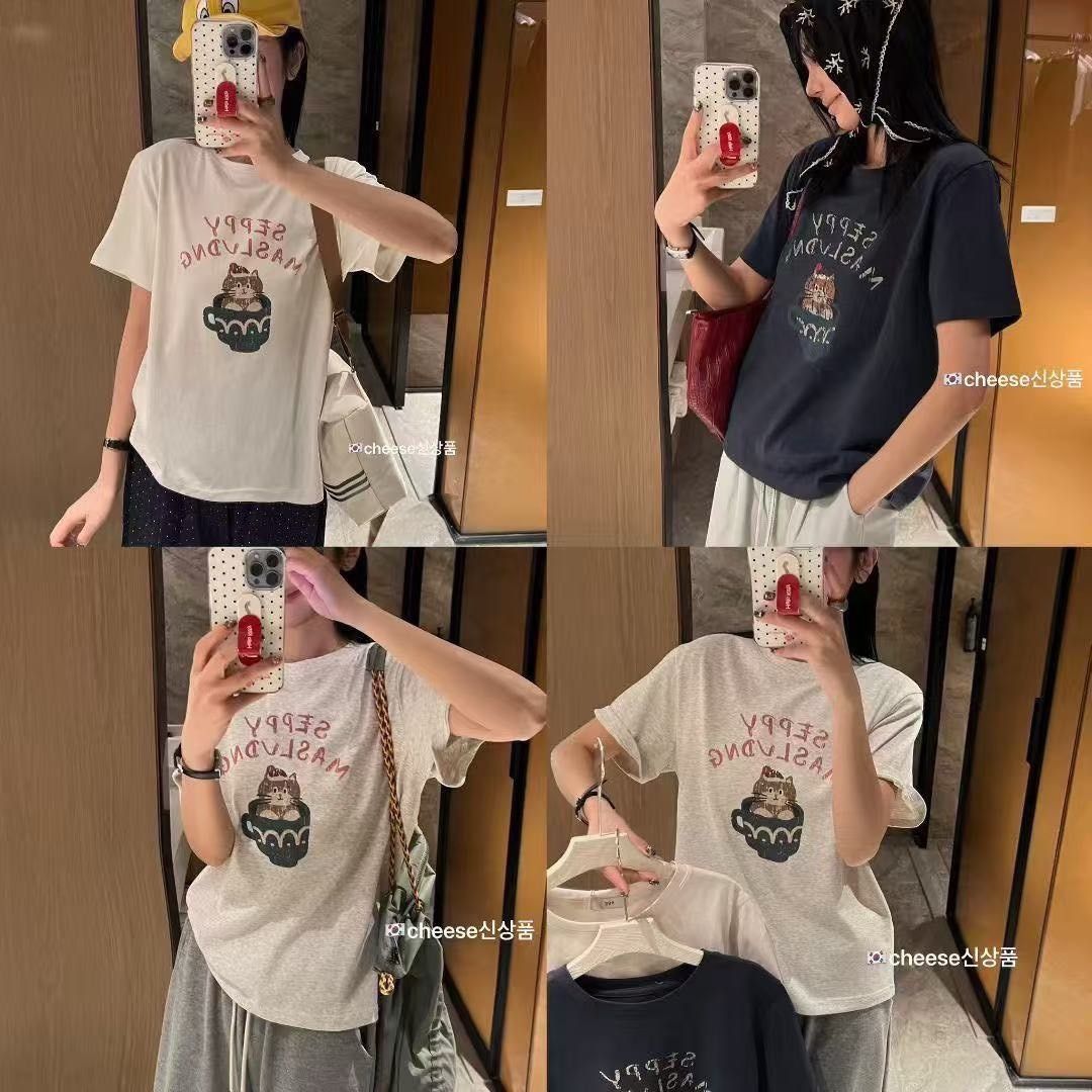 260312貓咪坐在杯子卡通圖ㄒ恤