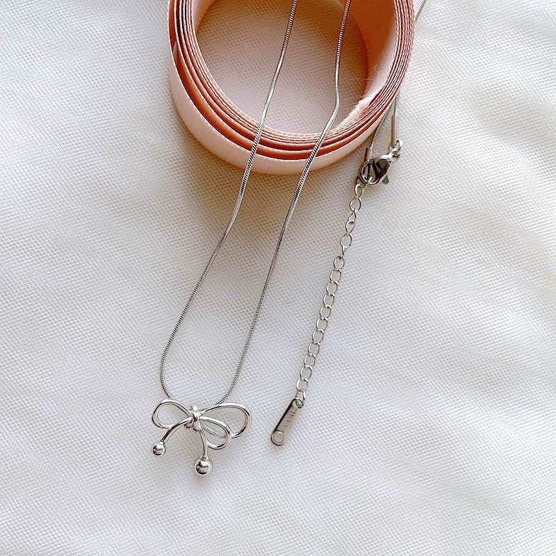 260314鏤空圓潤蝴蝶結項鍊