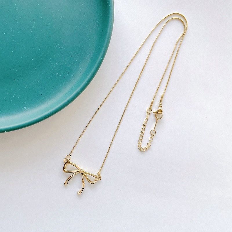 260314甜酷風不規則線條蝴蝶結項鍊