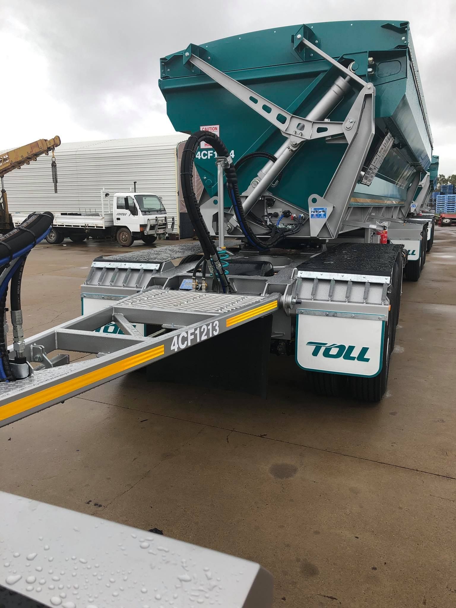 A Green and White Toll Dump Truck Trailer — Aust. Advanced Trailer Sales & Service in Darwin, NT