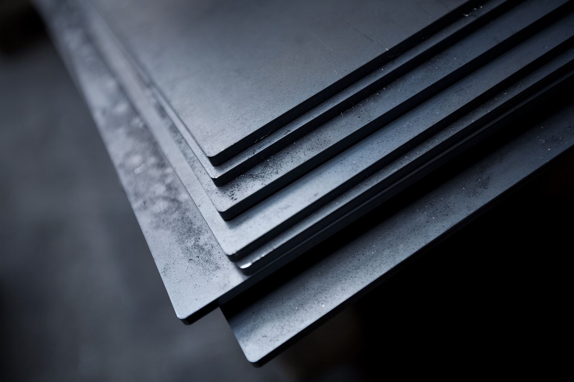 Metallic plates with shavings in a factory, captured with shallow depth of field. Metallic plates with shavings in a factory, captured with shallow depth of field.