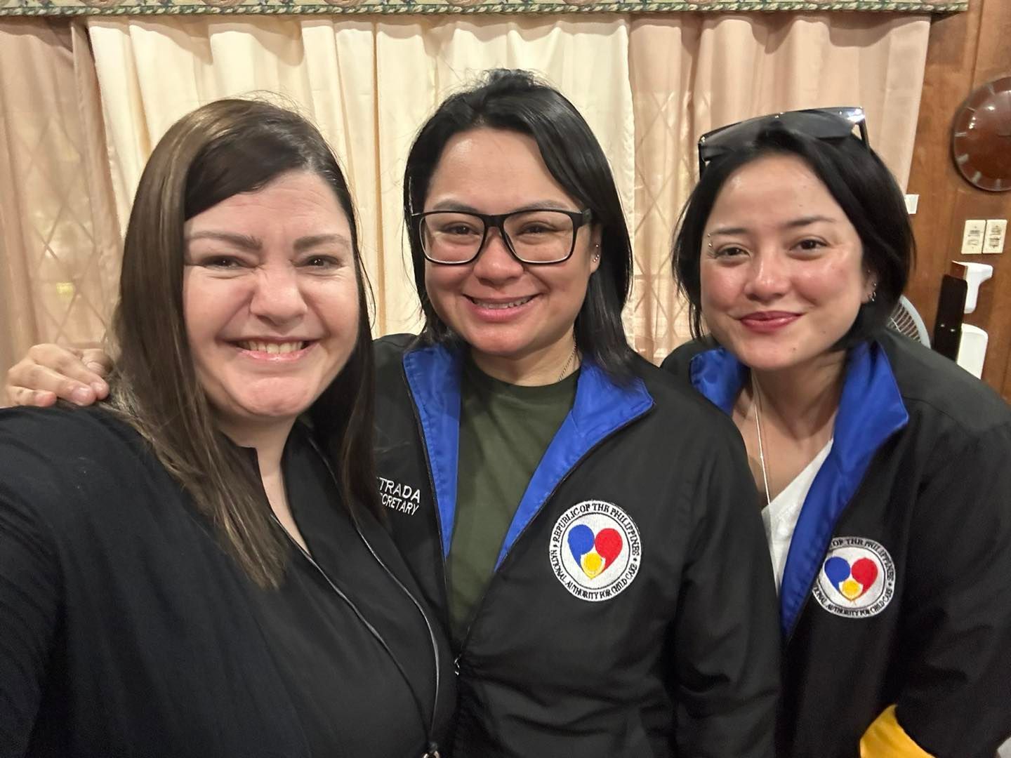 Group reading Bibles outdoors; people in chairs, hands clasped in prayer.