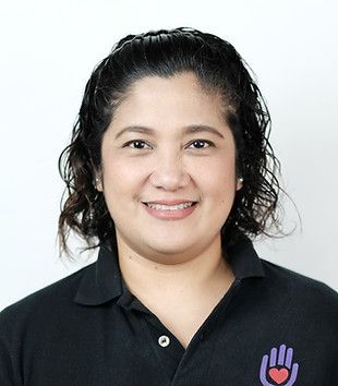 Group reading Bibles outdoors; people in chairs, hands clasped in prayer.