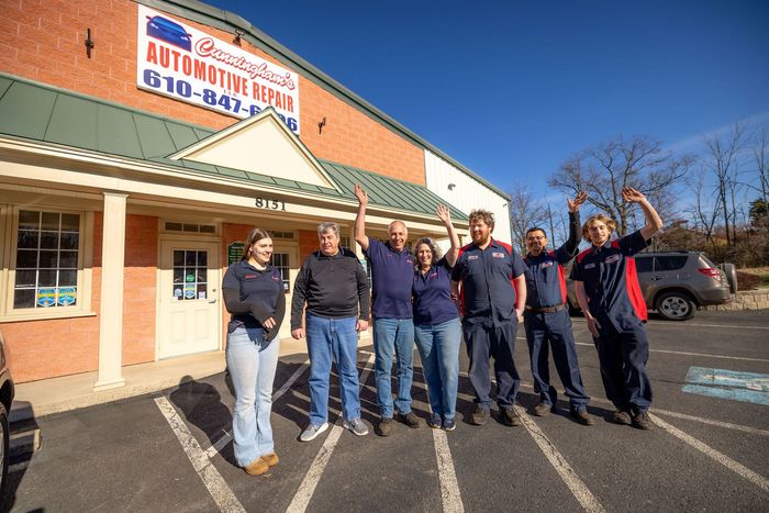 The exterior and crew of Cunningham's Automotive Repair in Ottsville, PA