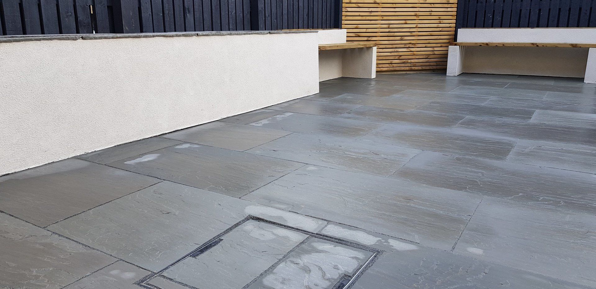 Grey sandstone paving