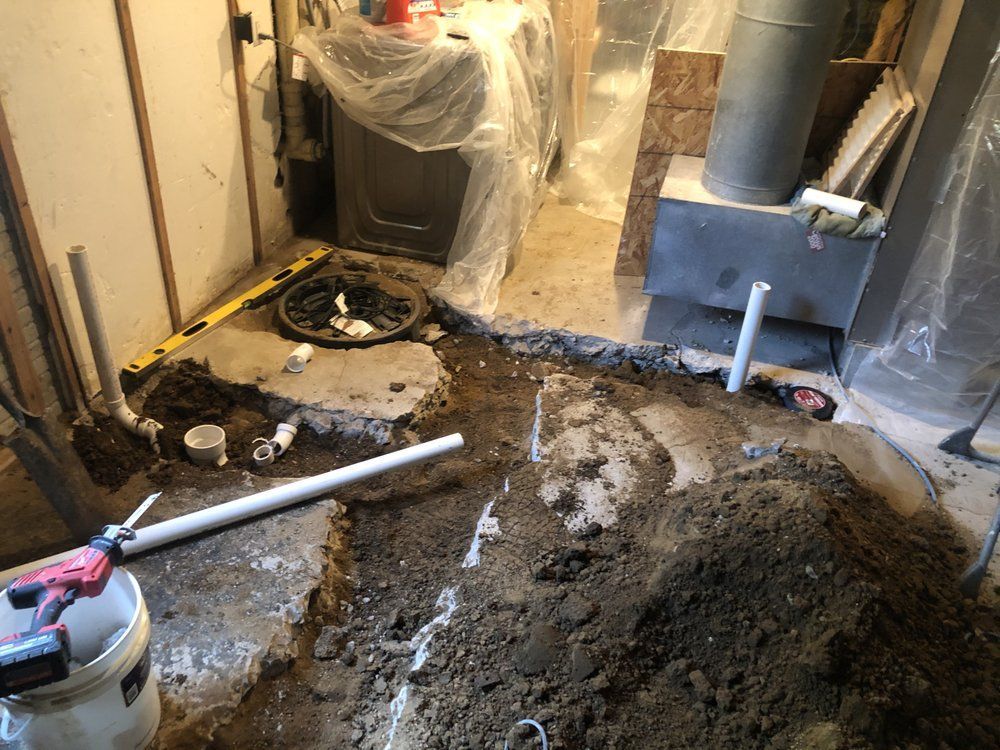 White Pipes At The Ground — Green Valley, IL — Derek Bell Plumbing