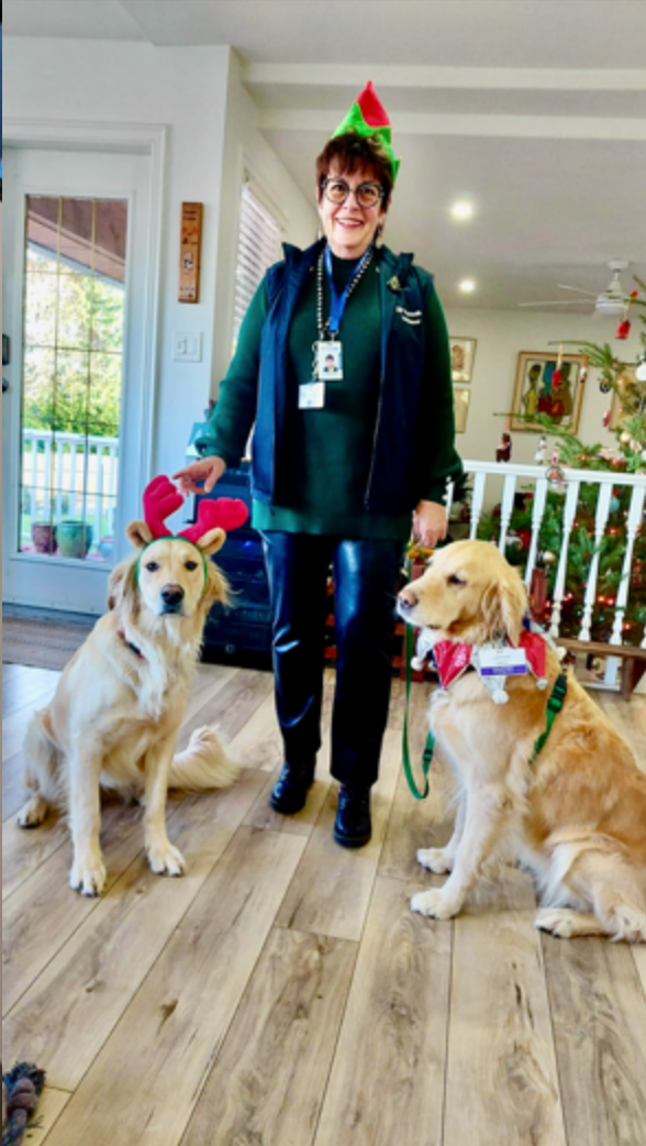 Coco, Daisy, and Carolyn volunteering at Langley Lodge.