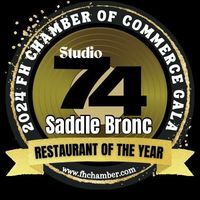 Saddle Bronc Restaurant of the Year 2022 award logo with green, gold, and white elements.