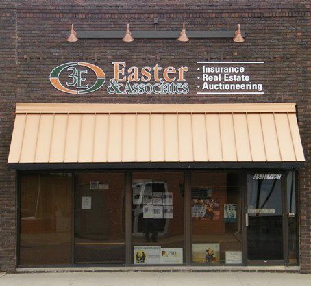 A brick building with a sign that says 3e easter & associates