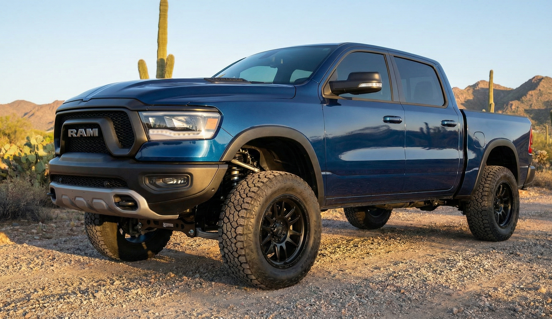 Mechanic using alignment tools on a car tire in a garage, wearing blue gloves.