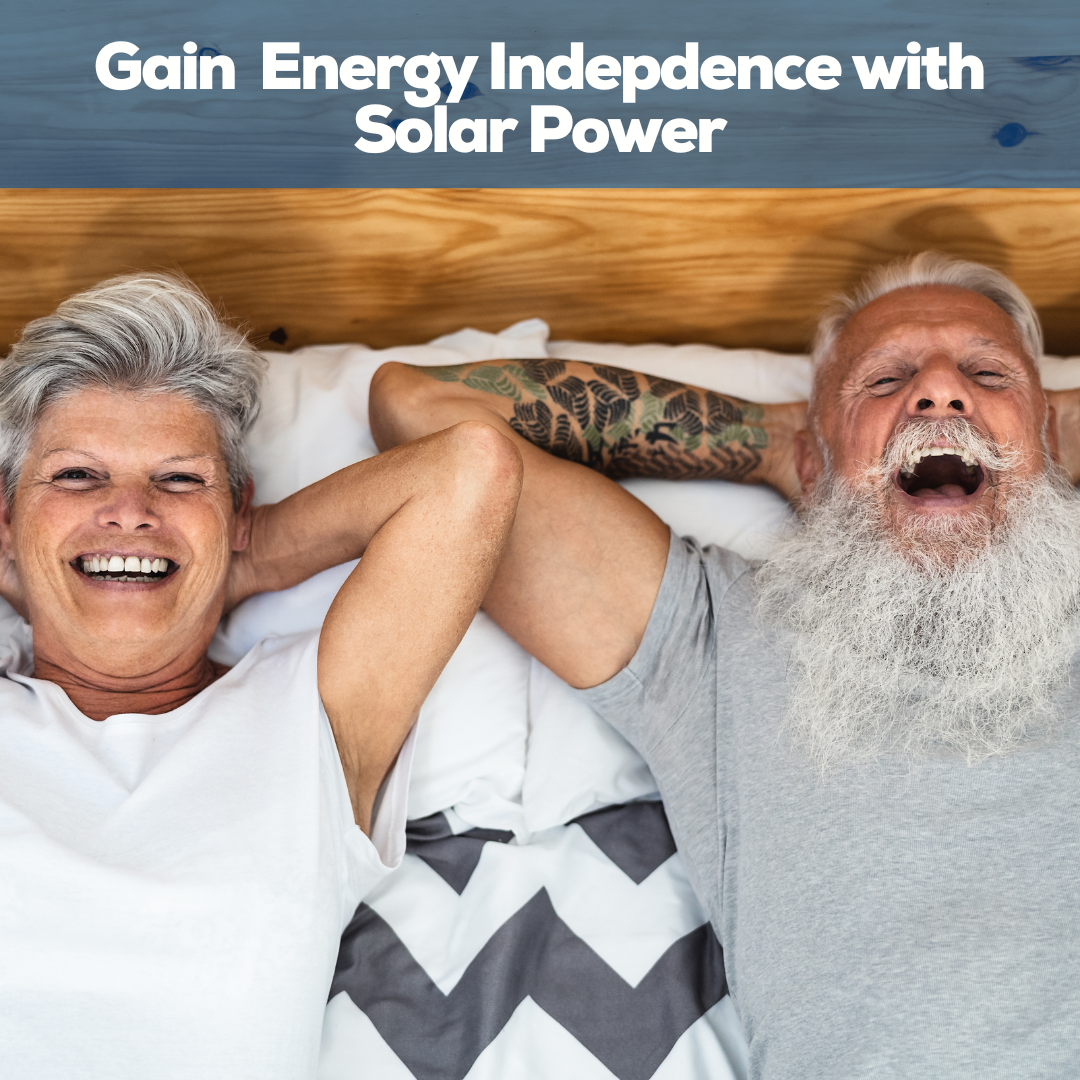 Elderly couple lying on bed laughing - enjoying their impendence and free time