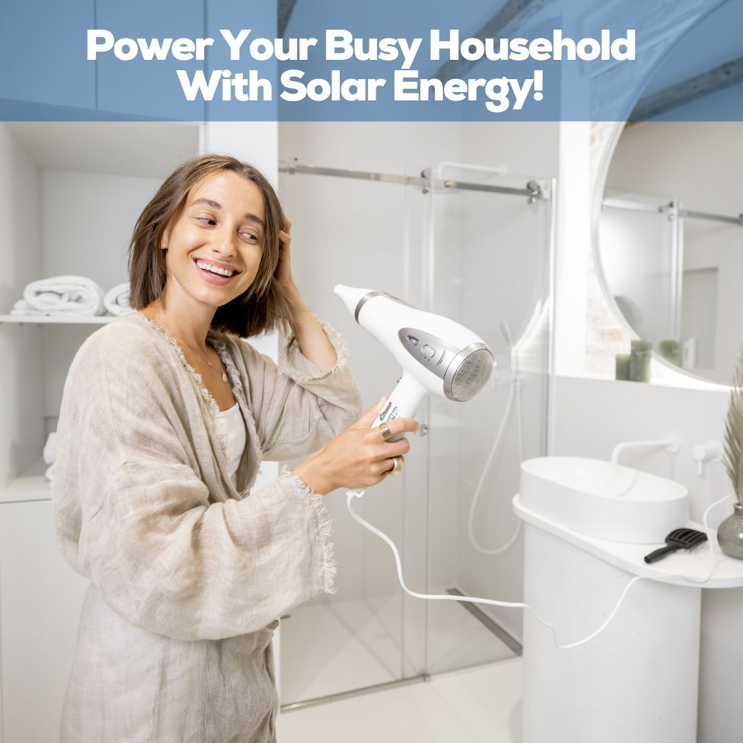 Teenage girl in bathroom blow drying her hair