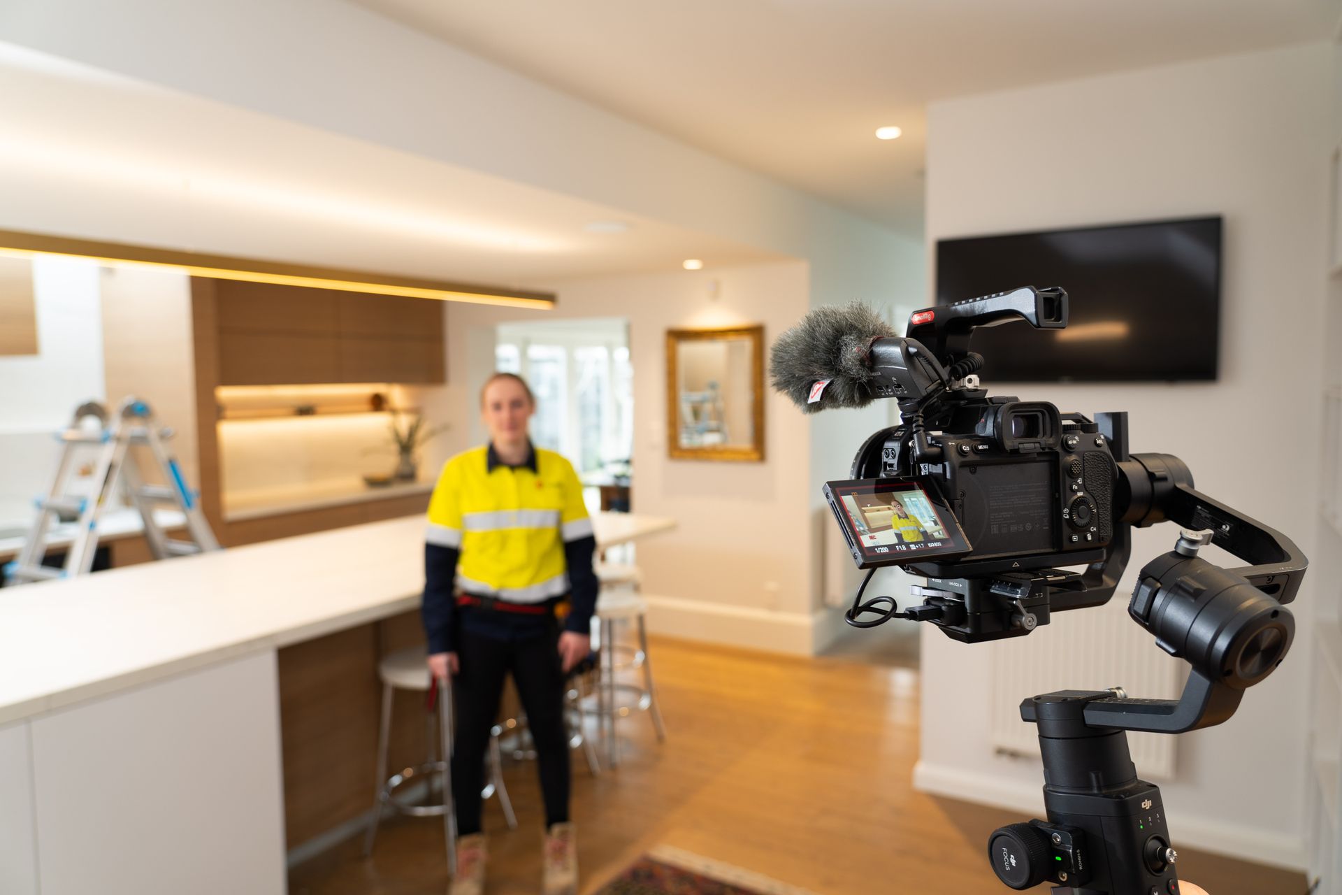 Christchurch Electrical Electrician - behind the scenes filming of brand video, in kitchen with camera