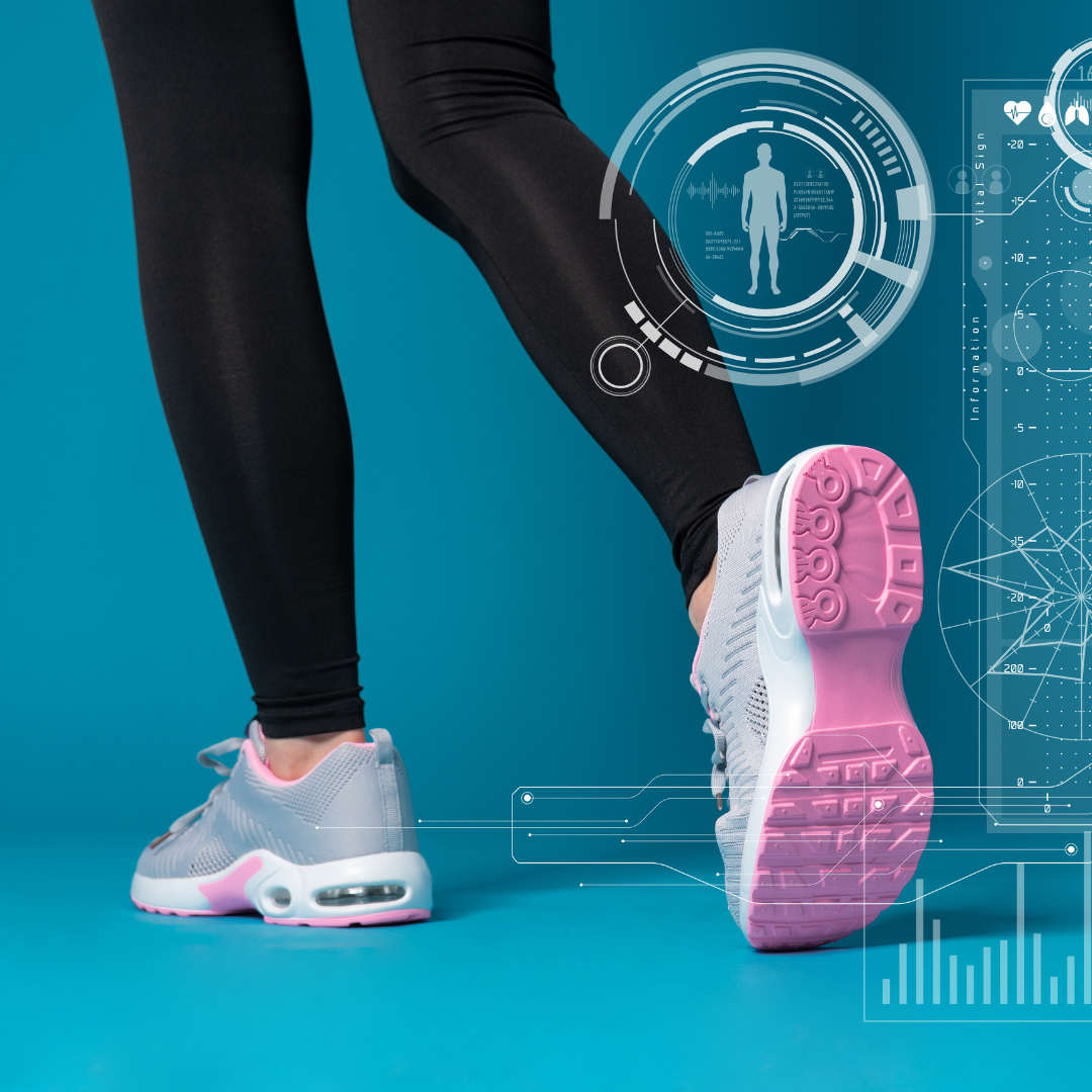 Women's legs in fitness tights and trainers