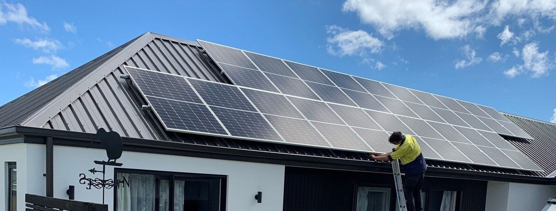 Solar panels being installed on a house by Christchurch Electrical Solar.