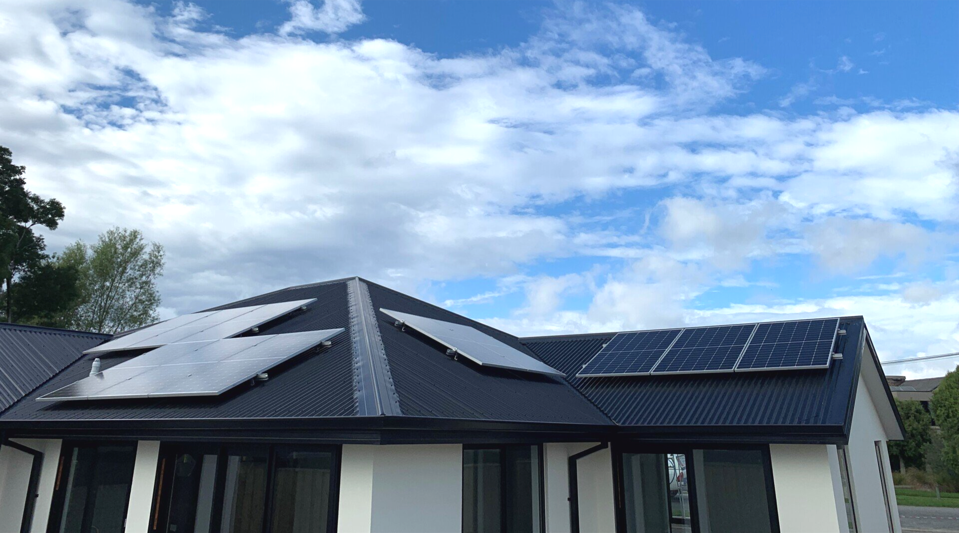 Black solar panels on residential roof