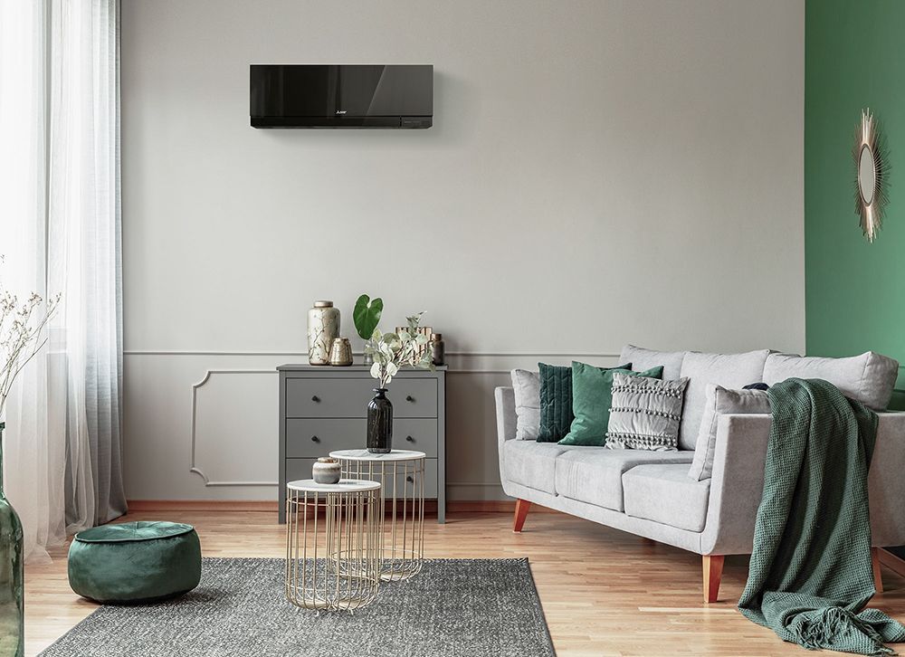 Mitsubishi Electric Designer Series black heat pump in living room