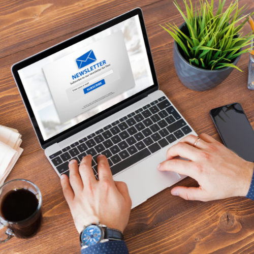 Person using laptop to read electronic newsletter