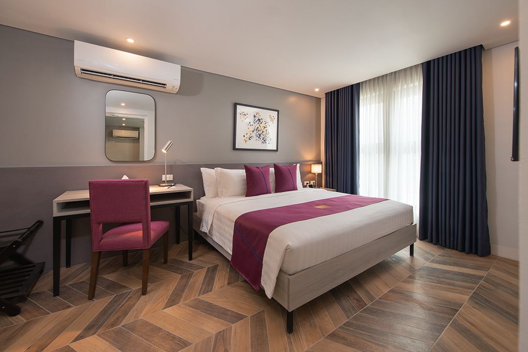 Private bedroom in the Belamy House one-bedroom suite, ideal for an affordable staycation in Makati.