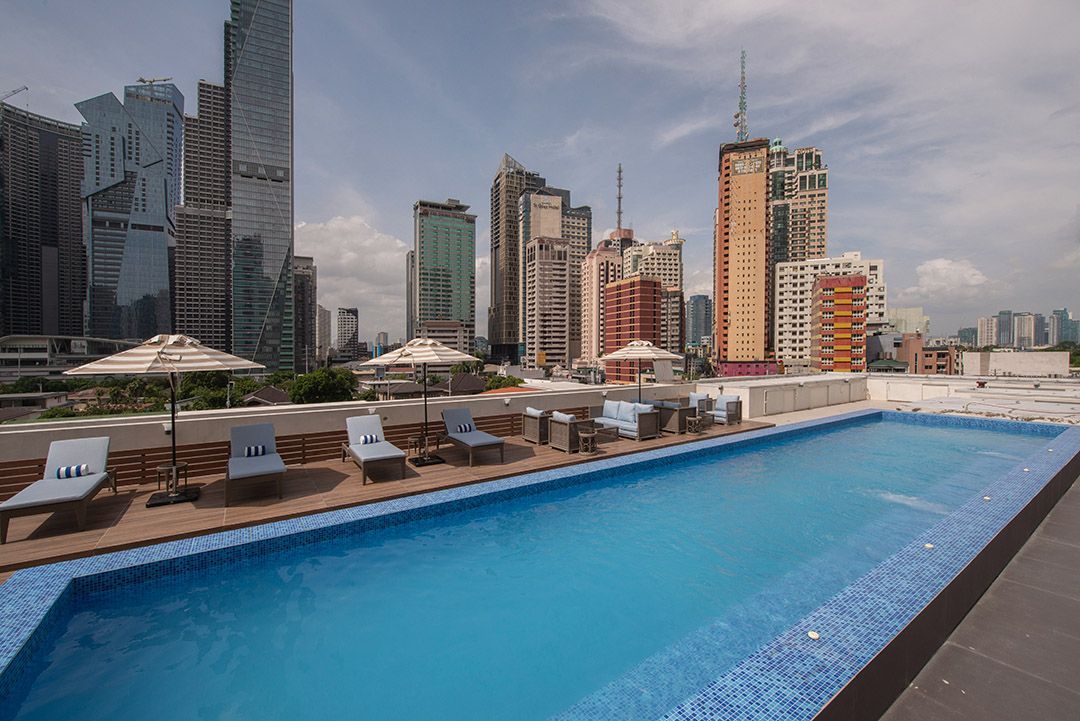 Enjoy the rooftop swimming pool experience.