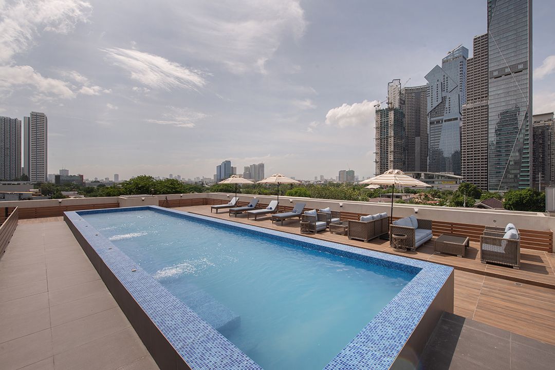 Rooftop pool with Makati skyline views