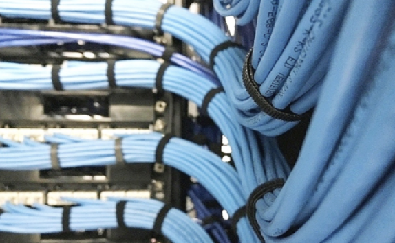 A bunch of blue wires are stacked on top of each other