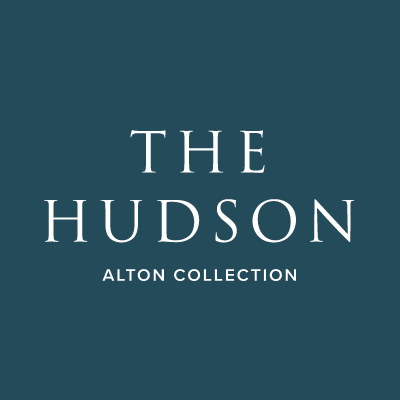 A blue background with white text that says the hudson