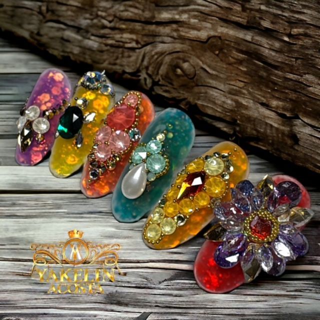 A bunch of colorful hair clips are sitting on a wooden table