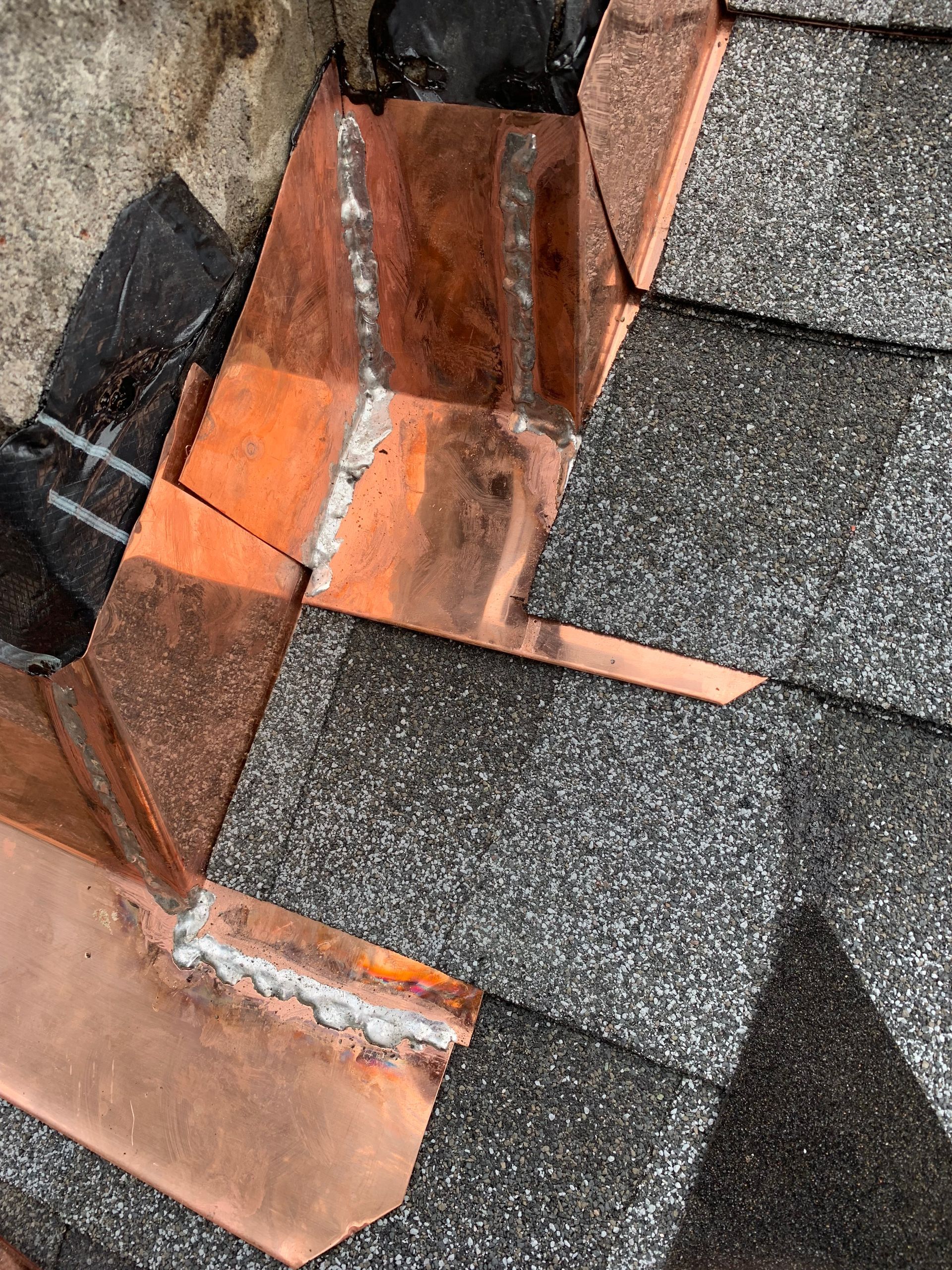 Copper step flashing installation asphalt roof CT by Executive Homes LLC