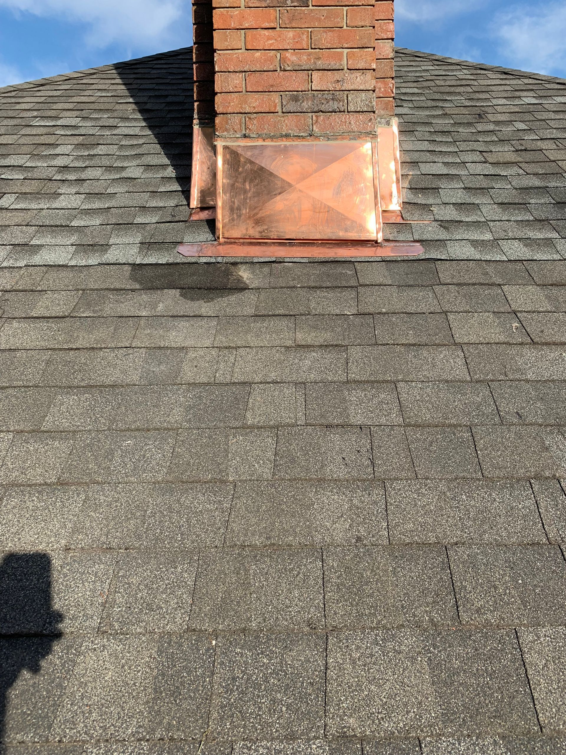 Copper chimney saddle and flashing installation CT by Executive Homes LLC