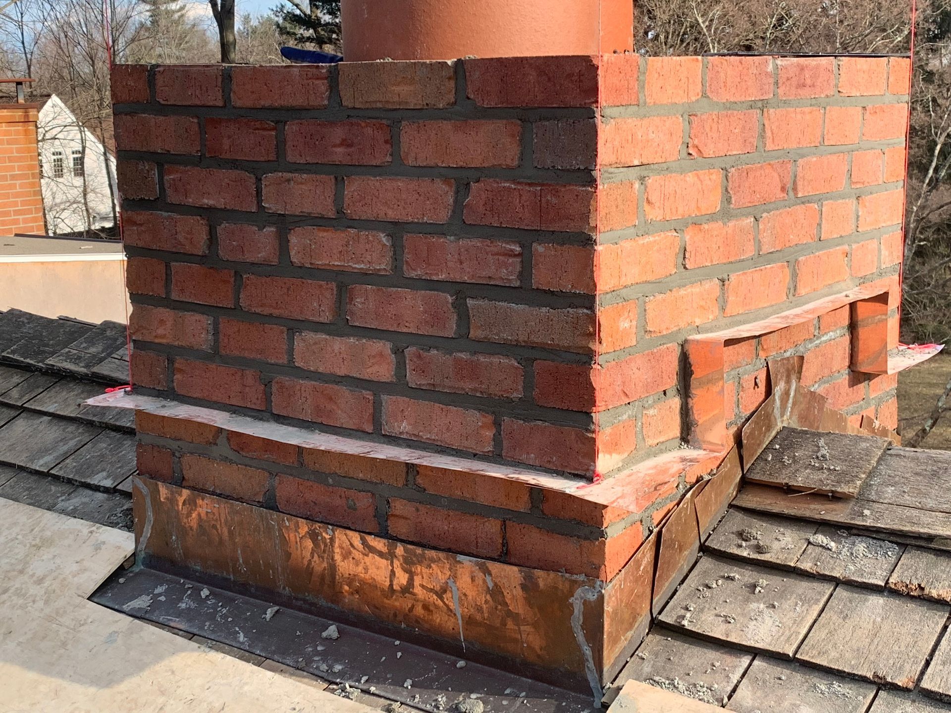 Full chimney rebuild and brick restoration Greenwich CT by Executive Homes
