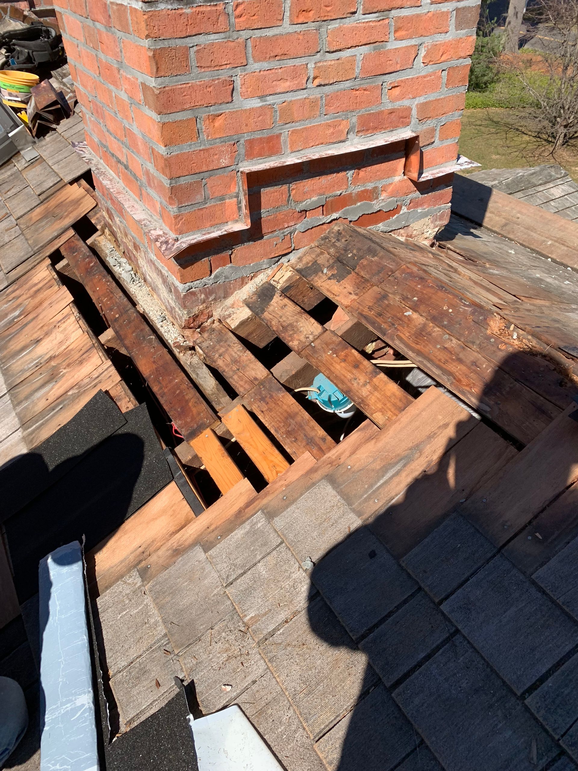 Brick chimney rebuild and flashing for cedar roof CT by Executive Homes LLC