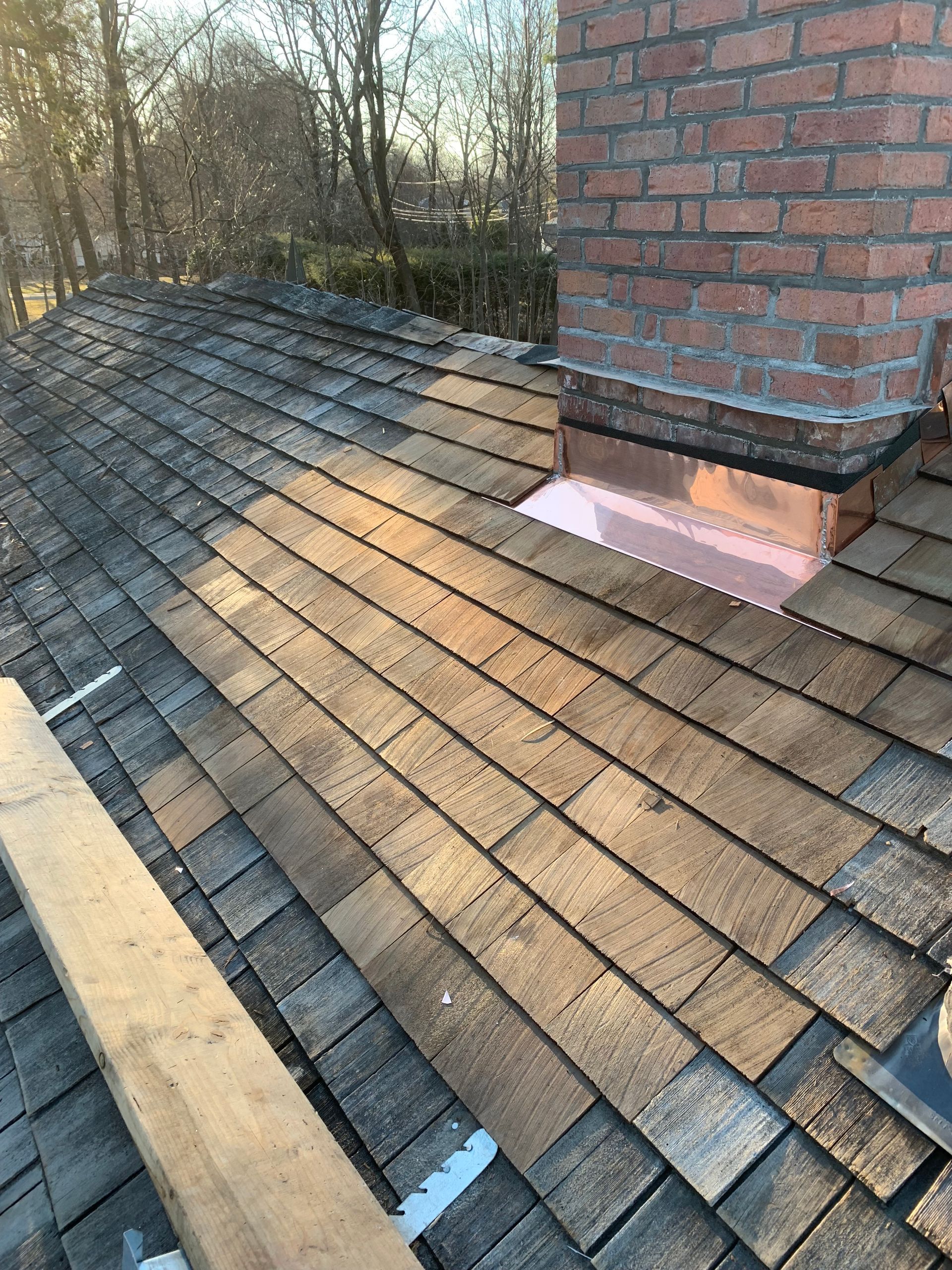 Chimney saddle and lead flashing installation CT by Executive Homes LLC