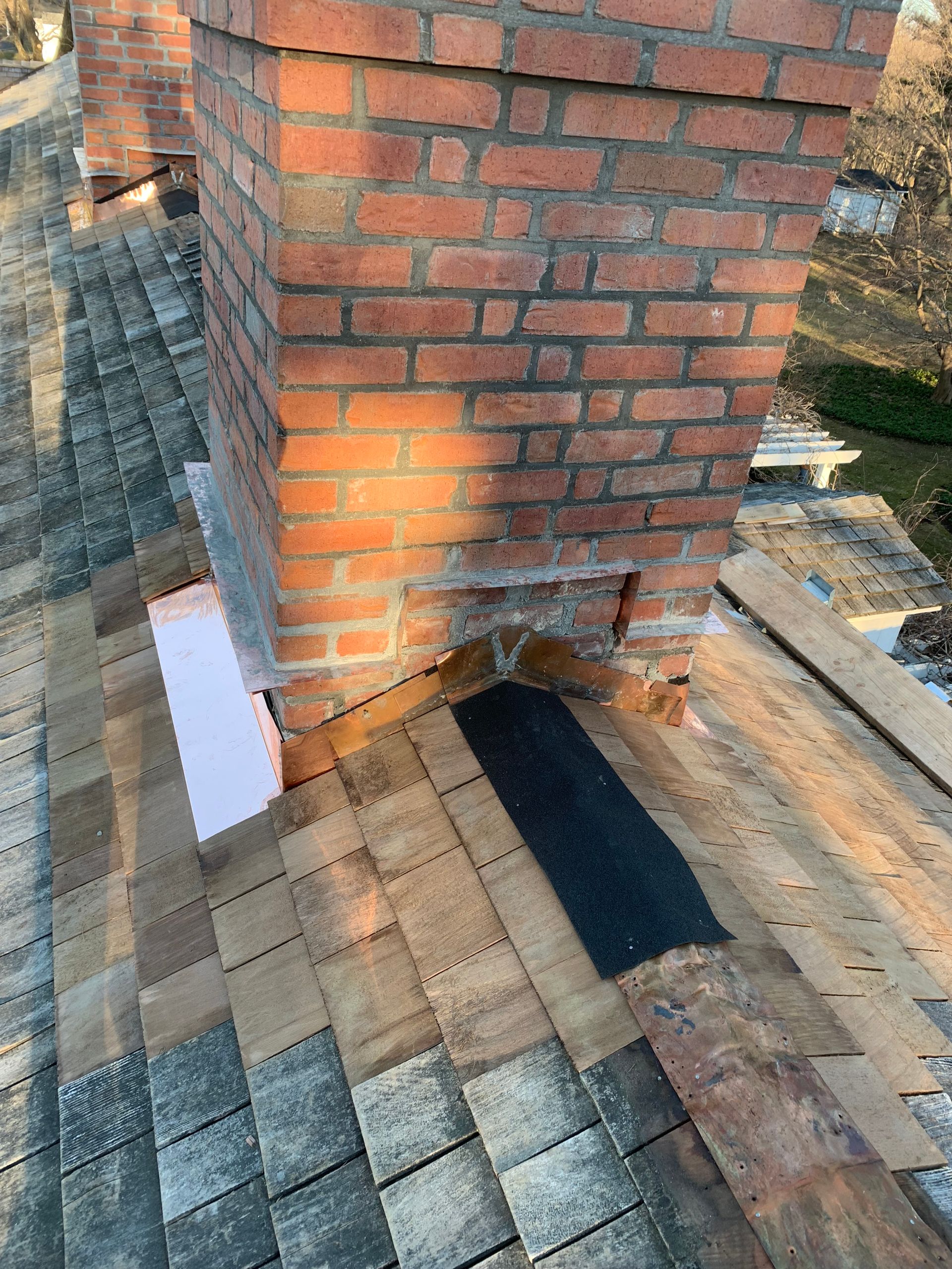 Copper chimney flashing and brick repair Fairfield County CT by Executive Homes