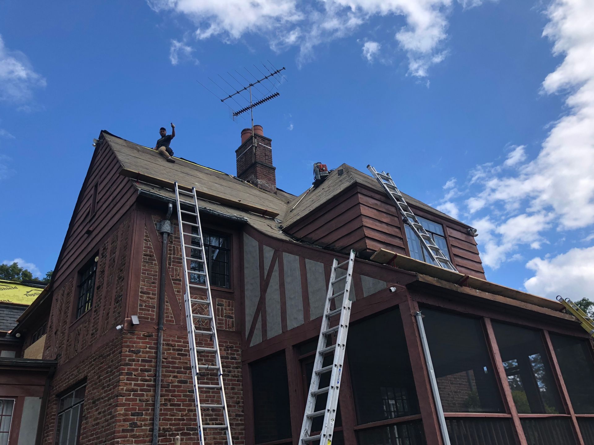 Roof replacement Tudor style home Fairfield County CT by Executive Homes