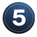 White number 5 on a dark blue circular badge with a thin gold ring