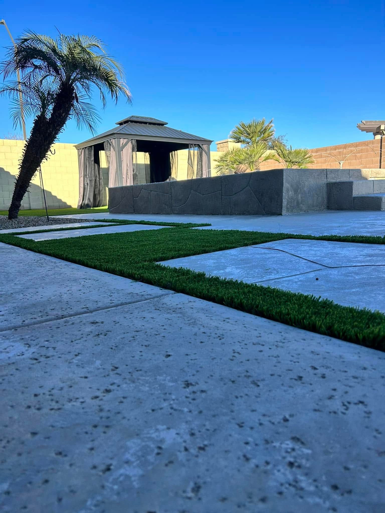 There is a gazebo in the background and a palm tree in the foreground.