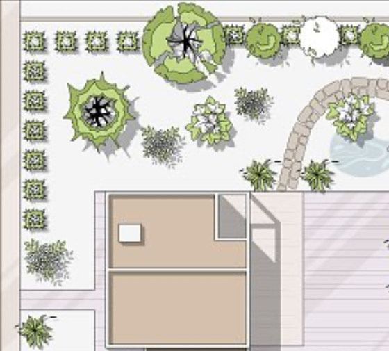 A large house with a brick driveway leading to it.