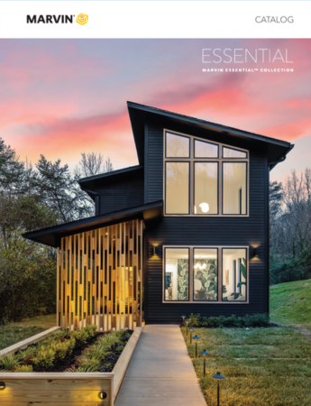 A black house with a lot of windows is on the cover of a catalog.