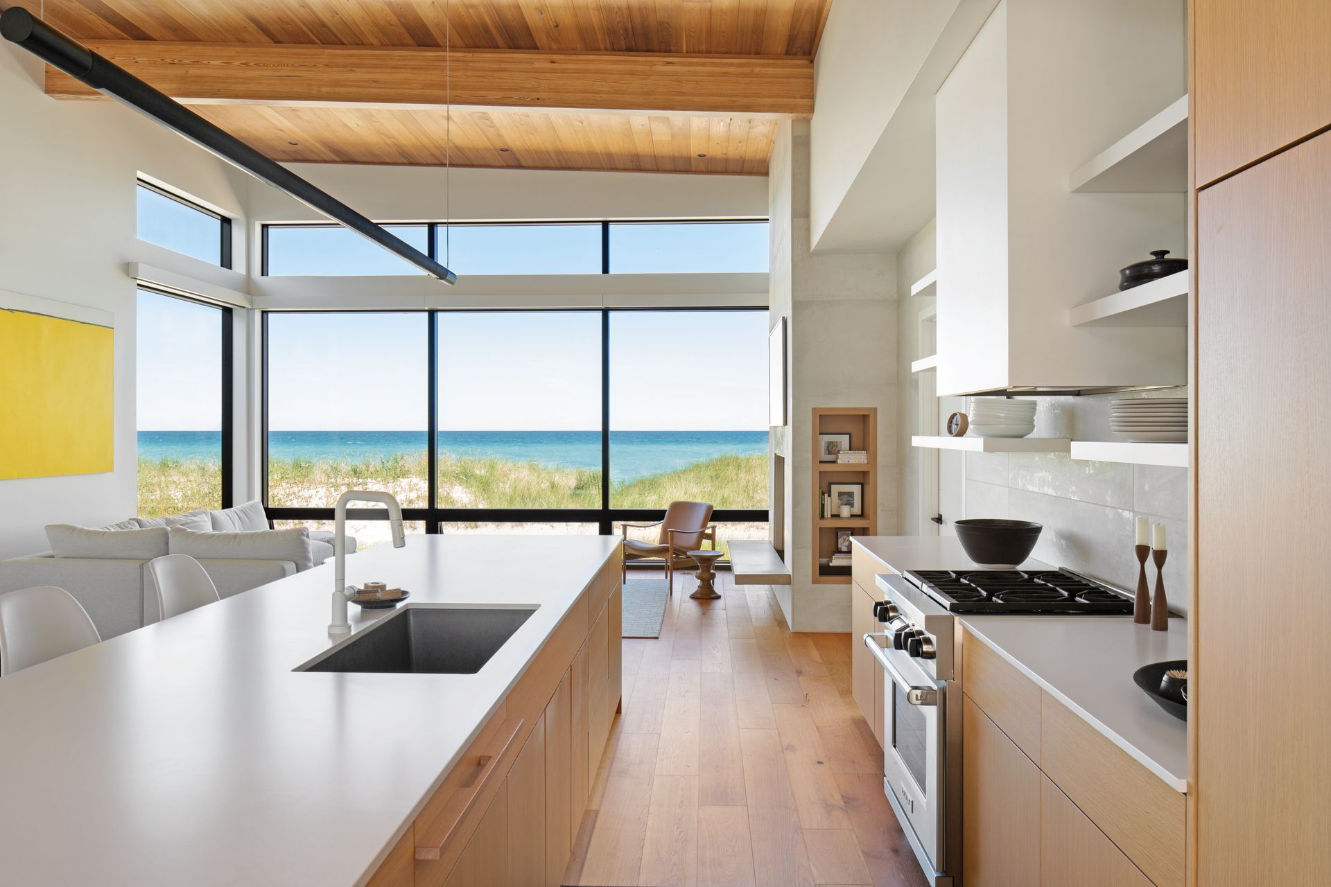 A kitchen in a house with a view of the ocean