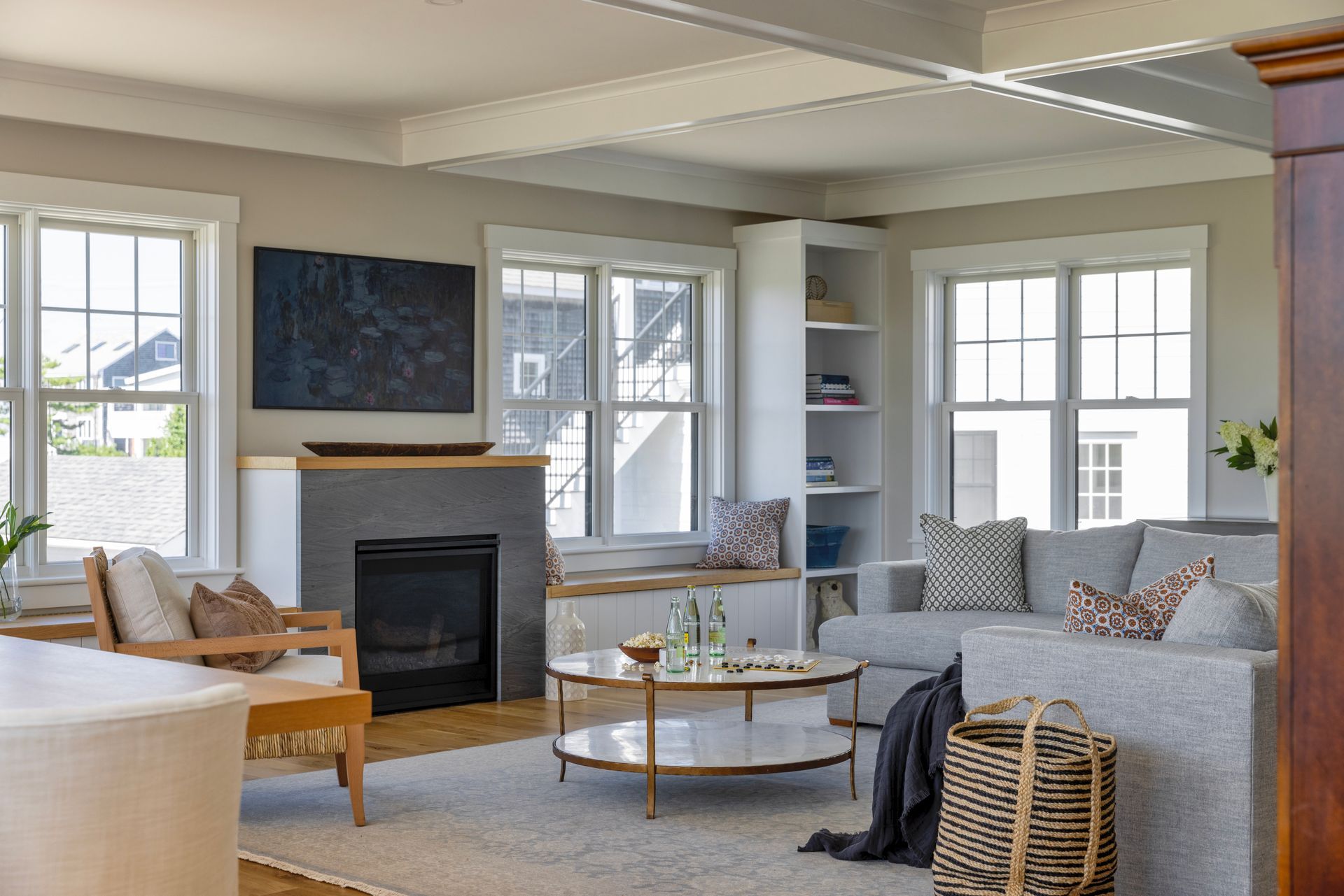 A living room filled with furniture and a fireplace.