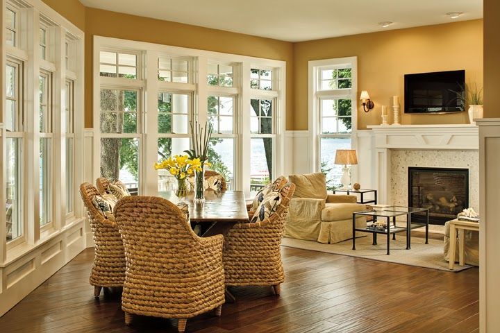 A living room filled with furniture and a fireplace.