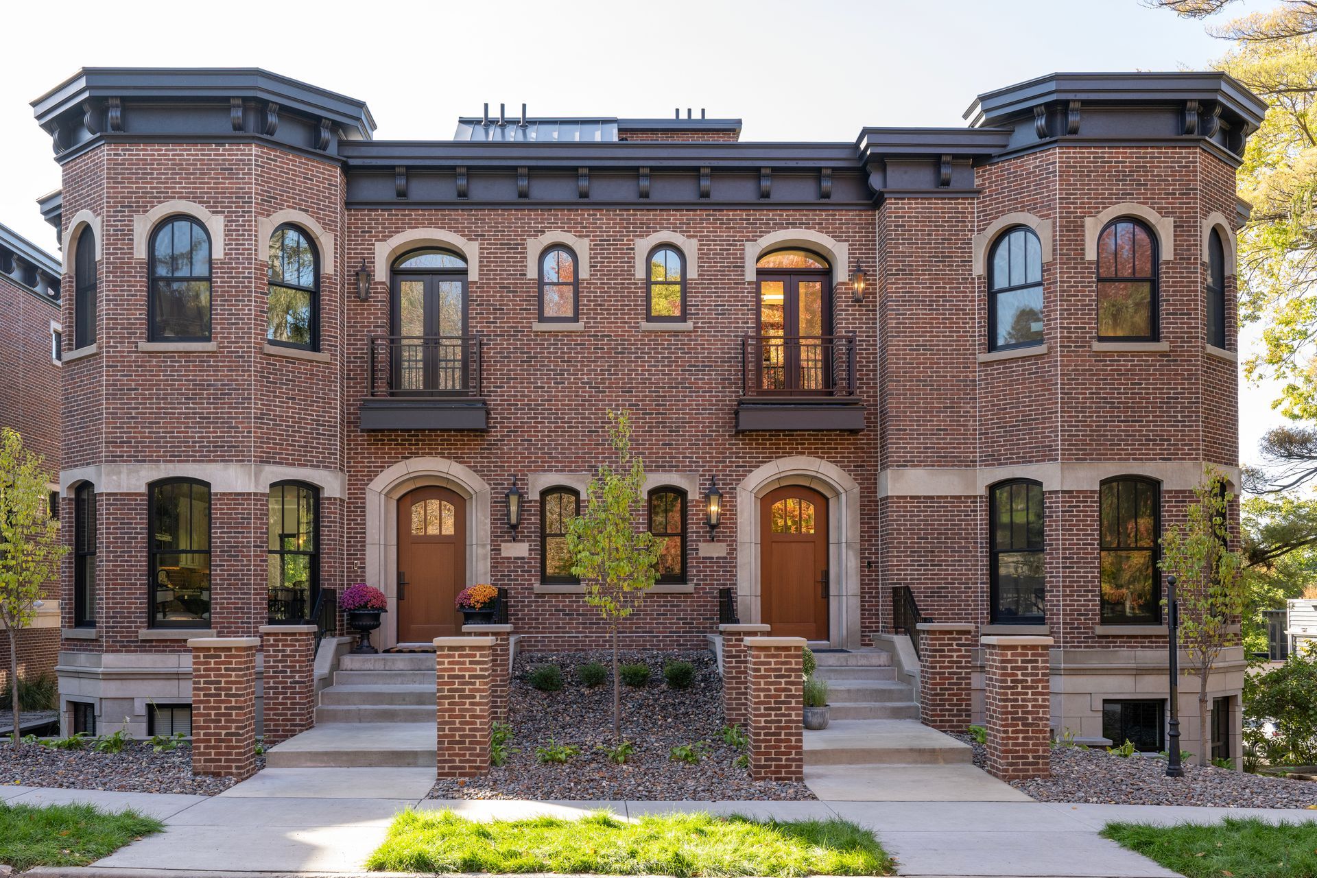 A brick building with a lot of windows and doors